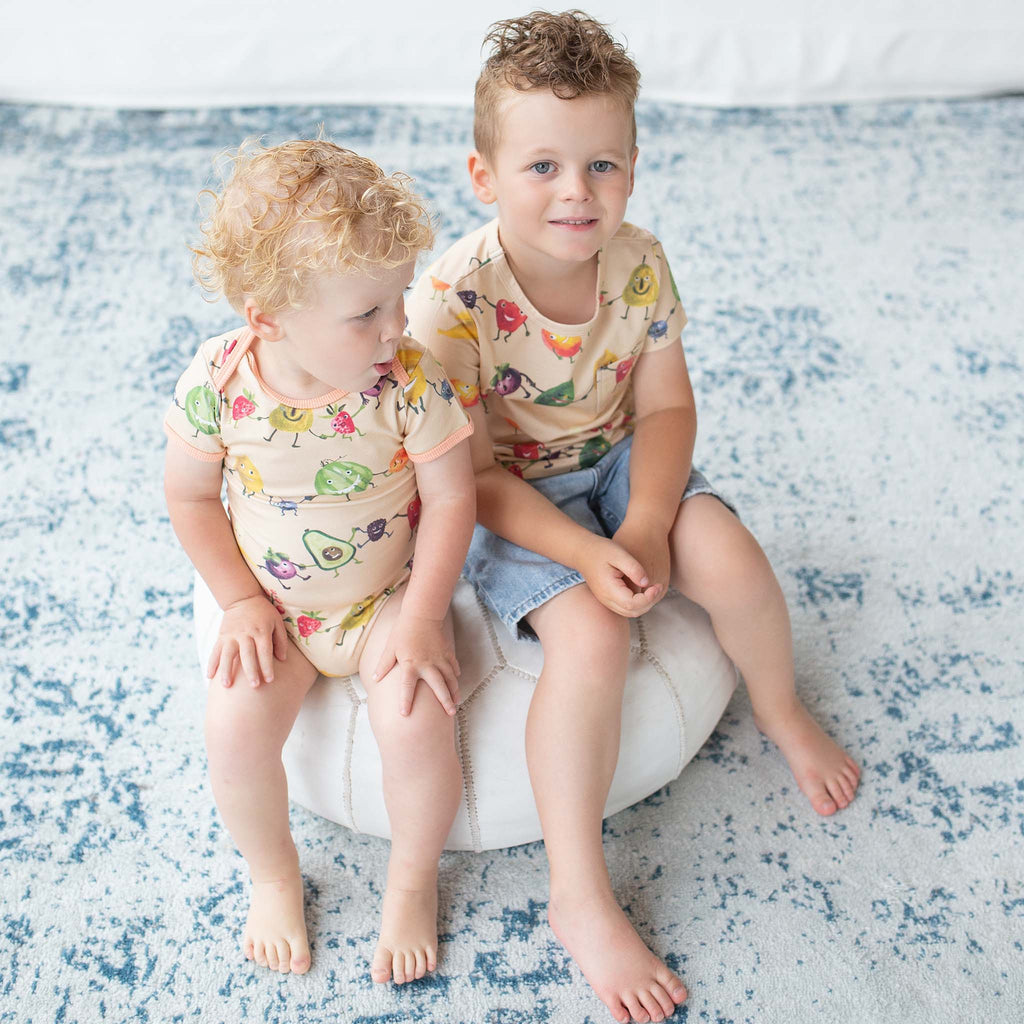 Anise & Ava gender neutral colorful hand drawn art eco friendly printed onto our luxury cotton for your babies. Made to match with siblings of all gender and ages. Picture with our Brooklyn kids' tee in the same Fruity Party print.