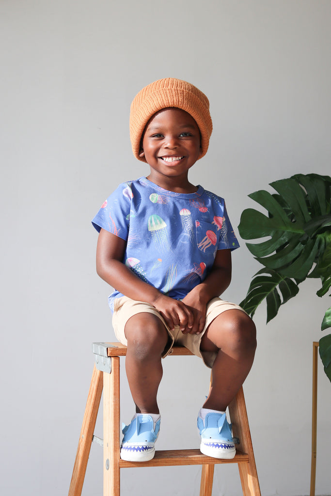 Anise & Ava genderless hand drawn exclusive artwork eco friendly printed on luxury cotton. Anise & Ava short sleeves pocket tee made to match with siblings' styles of baby romper, baby onesie, and kids' dresses or shorts. 